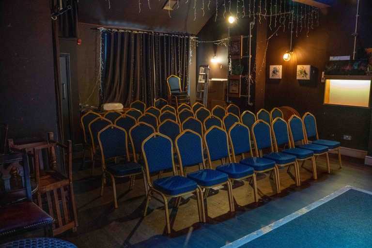 chairs line up in theatre style in function room 